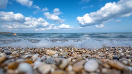 Poster - Scenic View of Rocky Shoreline with Gentle Waves and Cloudy Blue Sky : Generative AI
