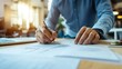 © The Little Hut - Businessman Analyzing Financial Graphs and Making Notes in Modern Office Setting : Generative AI