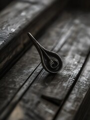 Poster - Intricate vintage metal object delicately placed on rustic wooden surface showcasing craftsmanship and uniqueness : Generative AI