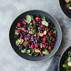 Canvas Print - Berry salad with spinach in bowl on table. Possible use recipe, healthy eating