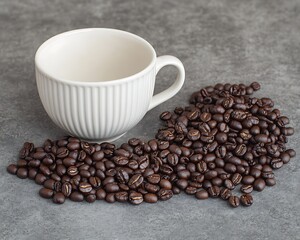 Wall Mural - Beans surround cup on gray surface, preparing morning drink for a coffee break