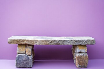 Canvas Print - Stone bench constructed from rocks set against a purple background