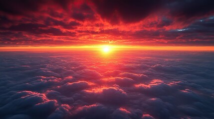Poster - aerial view of the sun setting over the clouds creating a colorful,dramatic sky