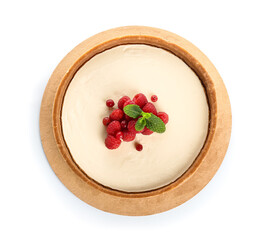 Wall Mural - sweet vanilla cheesecake with raspberries and red currants on white background