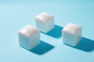 Wall Mural - Three white cubes on blue background, minimal shadow, product display