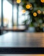© grey - A close-up of an empty table in the foreground, with a blurry office background, blurred focus, and bokeh lights.