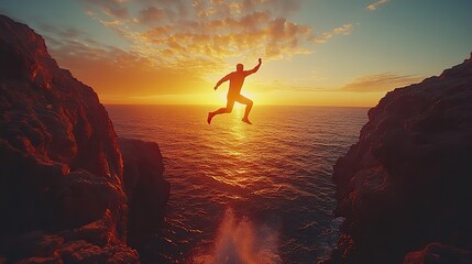 Poster - silhouette of a man leaping between two cliffs at sunset symbolizing perseverance positive mindset and the determination to overcome obstacles with an i can do it attitude