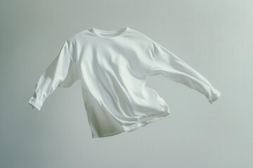 Wall Mural - minimalist white longsleeve tshirt floating in space perfect product photography with subtle shadows and fabric texture clean commercial composition