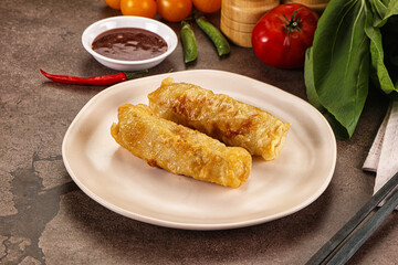 Wall Mural - Vietnamese stuffed spring roll served sauce