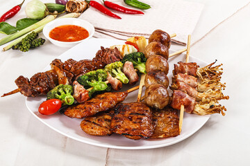 Wall Mural - Asian grilled skewer assortment satay