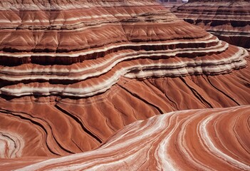 Poster - Striking Red Rock Layers. Ancient Geological Formation. Arid Landscape Beauty. Wave-like Curves and Flowing Lines. Natural History Wonder. A Mesmerizing Terrain.