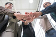 © PhugunStock - Asian business men and women join forces to check hands happily. Brainstorm and talk about analytics, innovation, and collaboration. online business Modern sales techniques and strategic planning