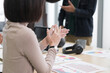 © PhugunStock - Asian business men and women applaud after brainstorming discussions on analysis, innovation and collaboration. Online business, sales techniques, modern strategic planning