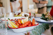 © Austockphoto - Modern Australian Christmas dinner with prawns and lemon slices