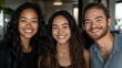 © Julia Jones - Diverse group of young adults smiling at camera in casual setting. National Internship Awareness Month