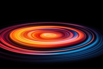 Poster - A vibrant, swirling pattern of colors radiates from a central point against a black background, creating a sense of motion and energy.