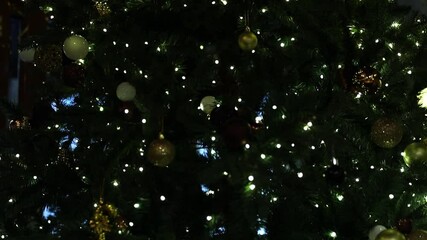 Poster - A large Christmas tree with a clock in the background, perfect for holiday decorations and events.