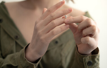 removing wedding ring, symbolic freedom, empowerment