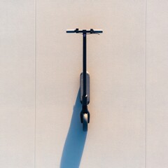Aufkleber - Minimalist Urban Mobility Sleek Electric Scooter on Textured Concrete - Smart City Transportation for Eco-Conscious Commuters and Modern Urban Design Integration