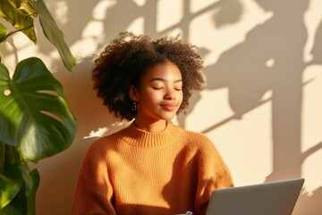 Fototapete - Serene Home Study Afro-Latina Student in Cozy Knit Solving Math with Laptop - E-Learning Trend and Remote Education Design in Soft Light