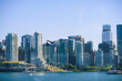 © Tetra Images - Seaplane flying above Burrard Inlet, downtown buildings in background