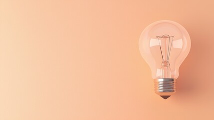Poster - stock has produced an image of an incandescent light bulb positioned on a vibrant orange background