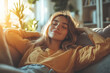 © fanjianhua - Young woman comfortably lying on the sofa in the living room