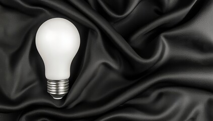 Poster - for a dramatic lighting effect, modern led bulbs are situated on black fabric