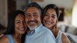 © Z A C - A group of smiling middle aged people suggesting closeness or celebration.