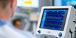 © Lila Patel - Medical Monitor Displaying Vital Signs in Hospital Setting