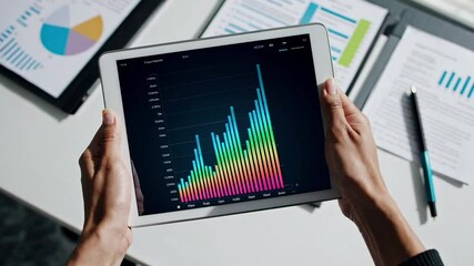 Aufkleber - Financial professional analyzing positive business progress on digital tablet, demonstrating growth metrics with professional confidence in slow motion workplace environment