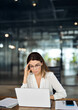 © insta_photos - Tired worried stressed 40 years old mature mid aged business woman wearing eyeglasses having headache at workplace feeling pain or burnout working on laptop computer in office.