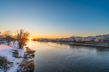 Wall Mural - Warta riverside at sunset in Gorzow Wielkopolski in winter. Poland