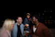 © liderina - Group of Multi-Ethnicity people having fun outdoor in the night. Celebrate.
