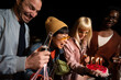 © liderina - Group of Multi-Ethnicity people having fun outdoor in the night. Celebrate.