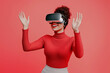 © kazakova0684 - A creative professional, fully immersed in a virtual experience with VR glasses, on plain background