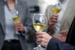 © amnaj - Business Professionals Socializing with White Wine