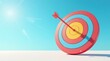 © Kittipat - Achieving Success A Colorful Target with Arrow Precisely Centered on Goal Under Bright Sunny Skies
