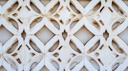 Fototapete - Intricate Architectural Design of a White Decorative Wall with Geometric Patterns and Textured Elements Highlighting Artisan Craftsmanship