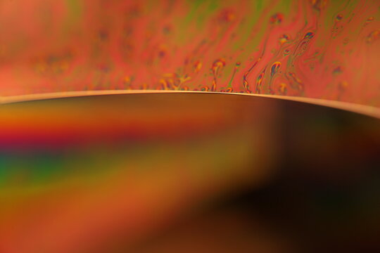 Green liquid surface, colourful abstract, surrealistic art, line of light, deep background