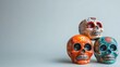 © Y_Malashkevych - Hand-painted sugar skulls showcase intricate designs in a minimalistic style