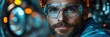 © Oleksandr - Focused worker in safety glasses within a high-tech industrial environment at dusk