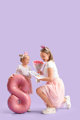 Wall Mural - Little girl greeting her mother with tulips, drawing and balloon in shape of figure 8 on lilac background. International Women's Day