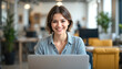 © drimerz - smiling short hair woman using laptop working at cafe