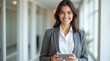 © Trascot - portrait of a businesswoman using a mobile phone