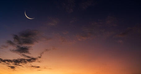 Wall Mural - crescent moon on dusk sky twilight after sundown, well free space for text arabic religious of islam