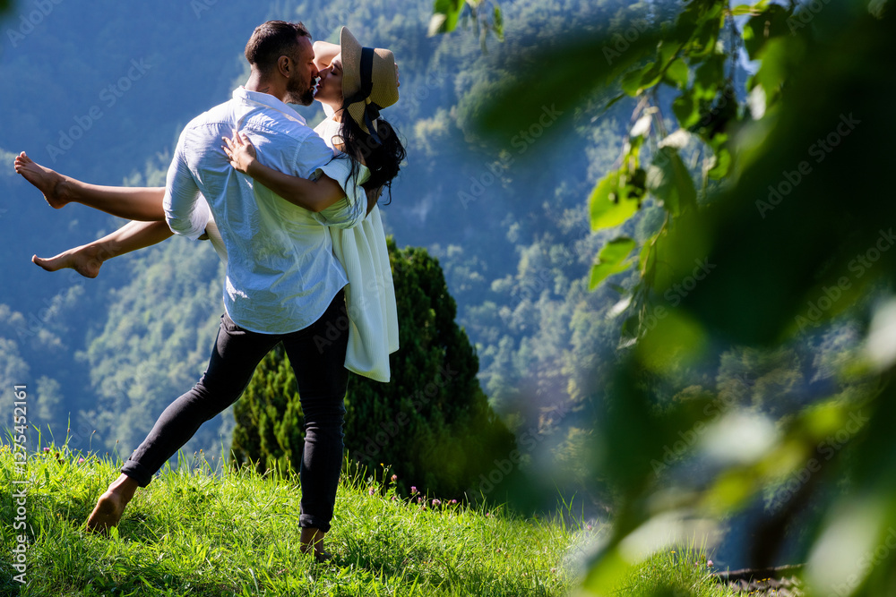 Young loving couple embracing on nature. Romantic kiss. Couple kiss on ...