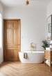 © ลลิดา ไชยศรีษะ - Modern Minimalist Bathroom Interior with Freestanding Tub and Wooden Flooring