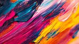 Textura vibrante de colores en un lienzo, con pinceladas audaces de rosa, azul y amarillo que crean una sensación de movimiento.
