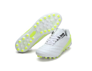 white and green striped design football shoes isolated 